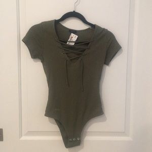 Lace-up green bodysuit
